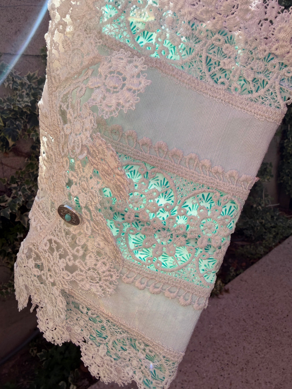Pochette dentelles et turquoise