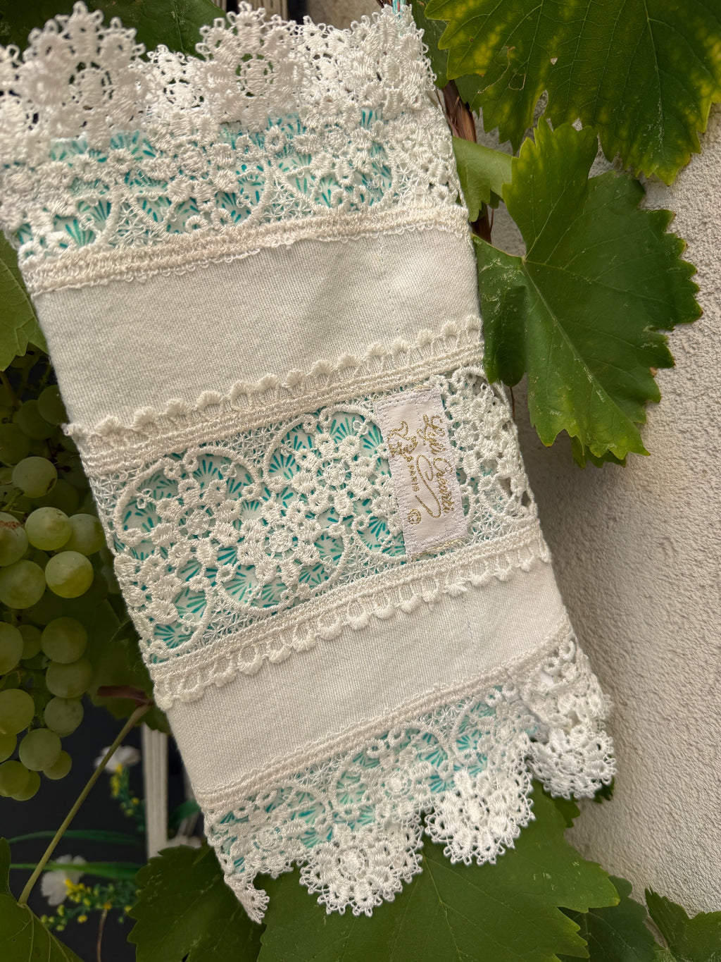 Pochette dentelles et turquoise