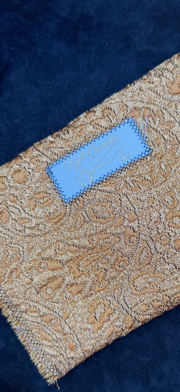 Pochette précieuse en brocart doré