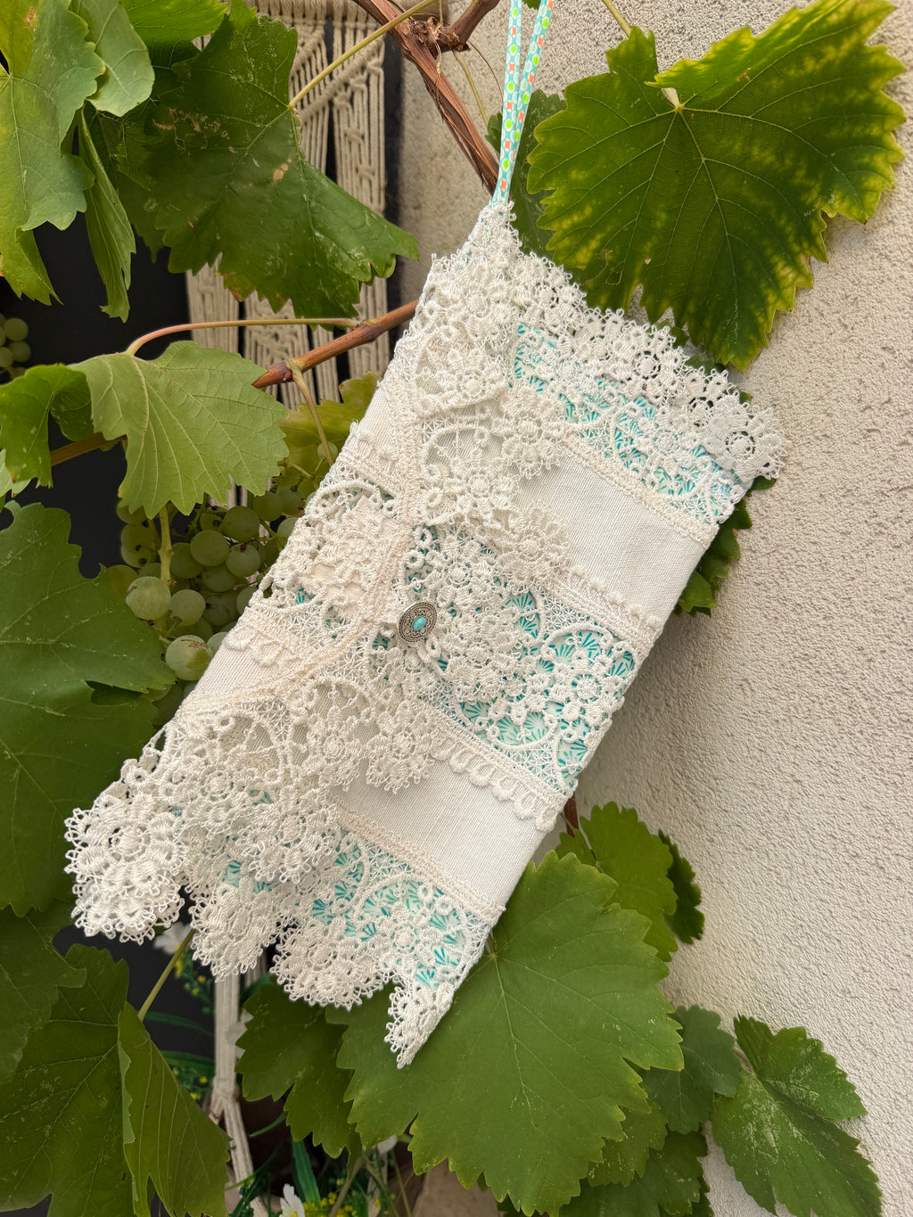 Pochette dentelles et turquoise