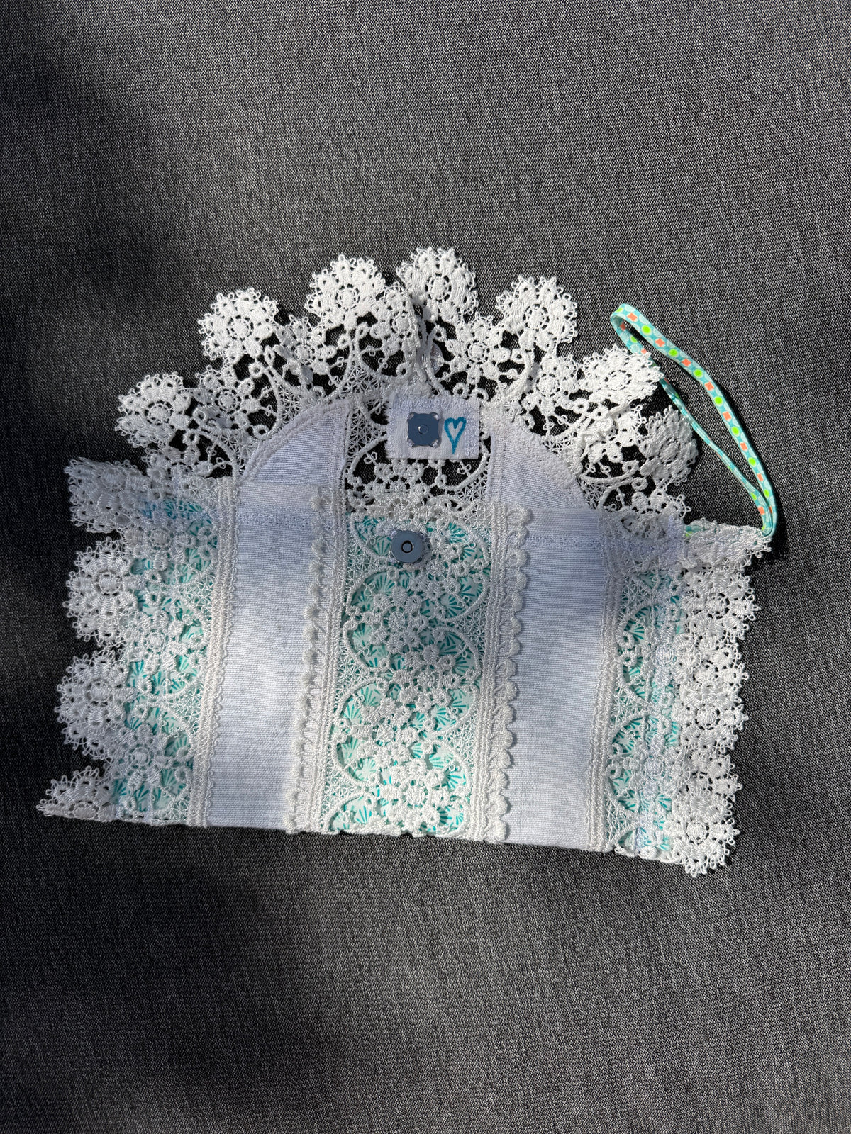 Pochette dentelles et turquoise