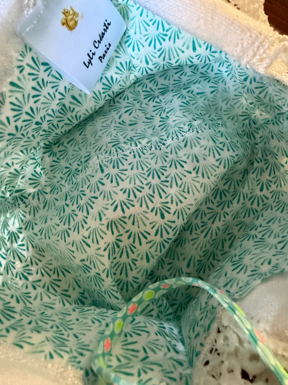 Pochette dentelles et turquoise