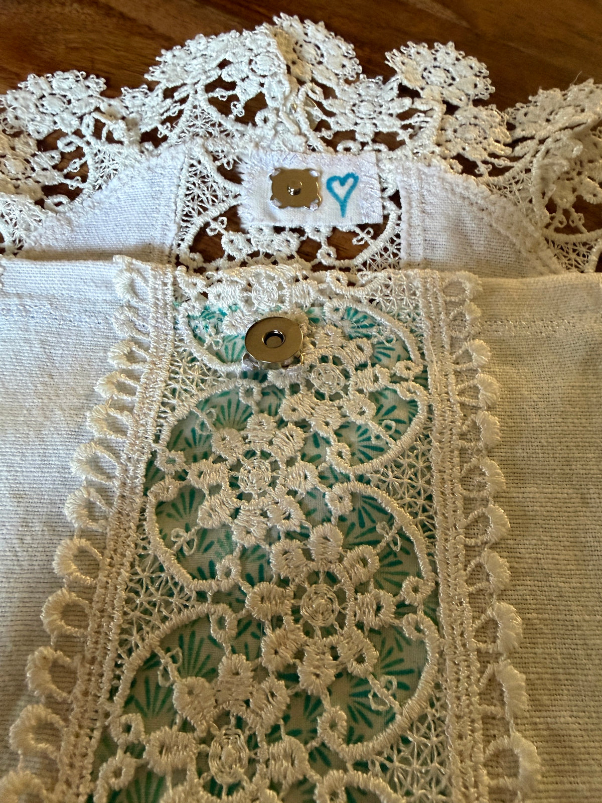 Pochette dentelles et turquoise