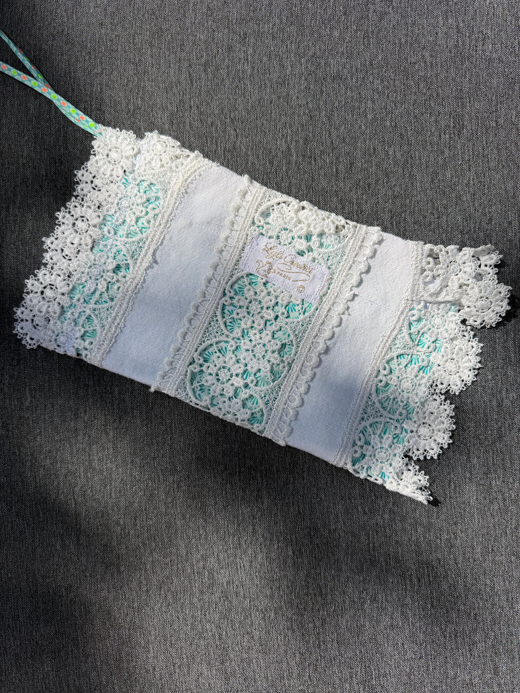Pochette dentelles et turquoise