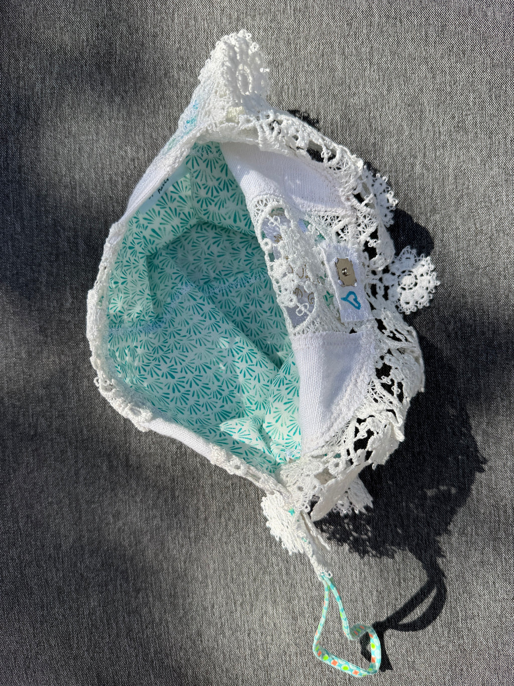 Pochette dentelles et turquoise