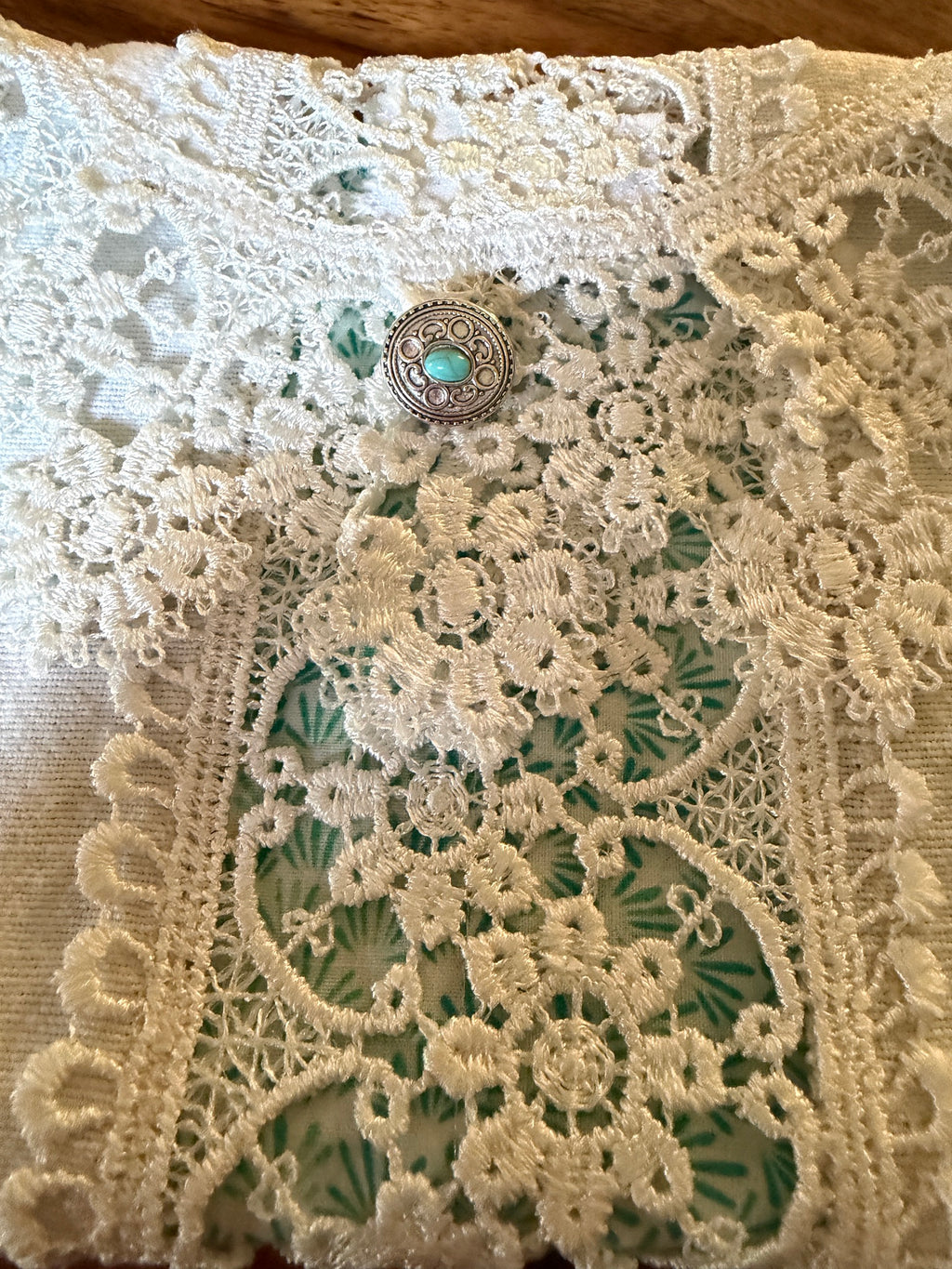 Pochette dentelles et turquoise